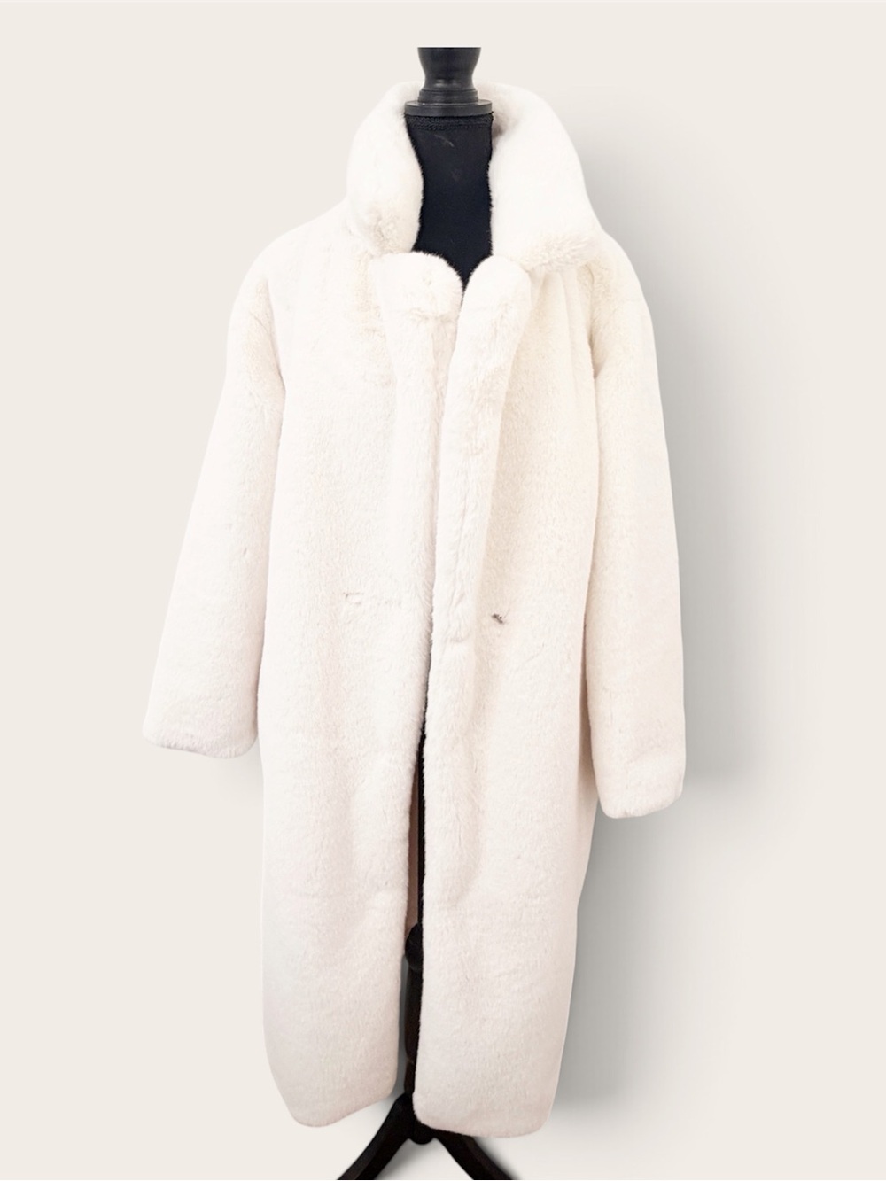 White faux fur coat